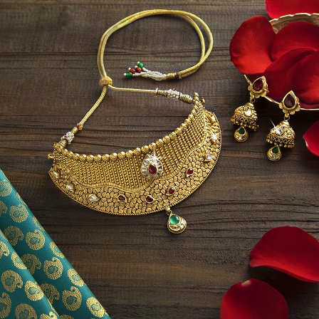Gold choker and jhumka set