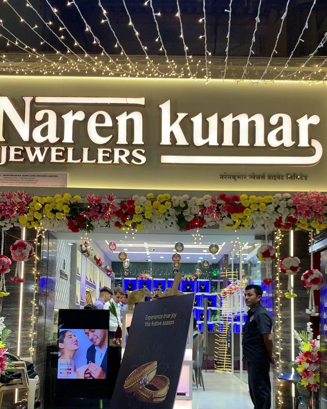 Narenkumar Kandivali shopfront at night, Thakur Village
